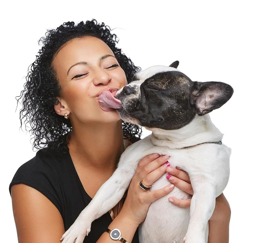 Owner kissing her French bulldog
